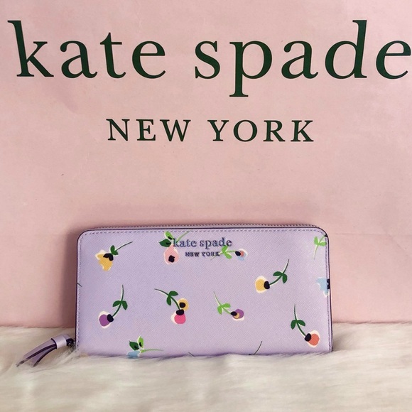 kate spade Handbags - KATE SPADE - Cameron Floral Ditsy Large Slim Bifold Wallet zip closure